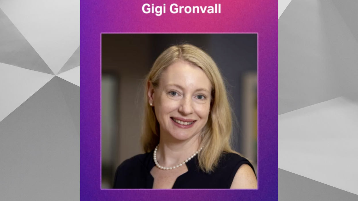 Headshot of Gigi Gronvall with gray background